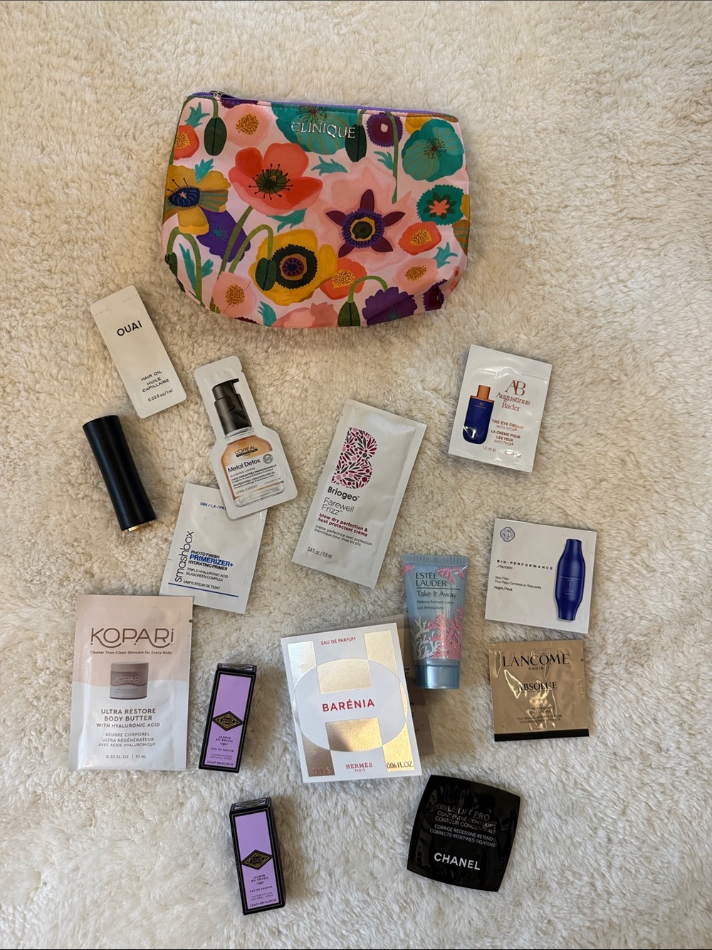 Clinique Pink Floral Cosmetic with 12 samples plus lipstick & makeup remover